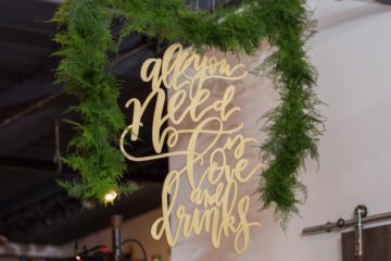 Lasercut signage hung from the ceiling and framed by greenery to celebrate Pantone's 2017 Color of the Year!