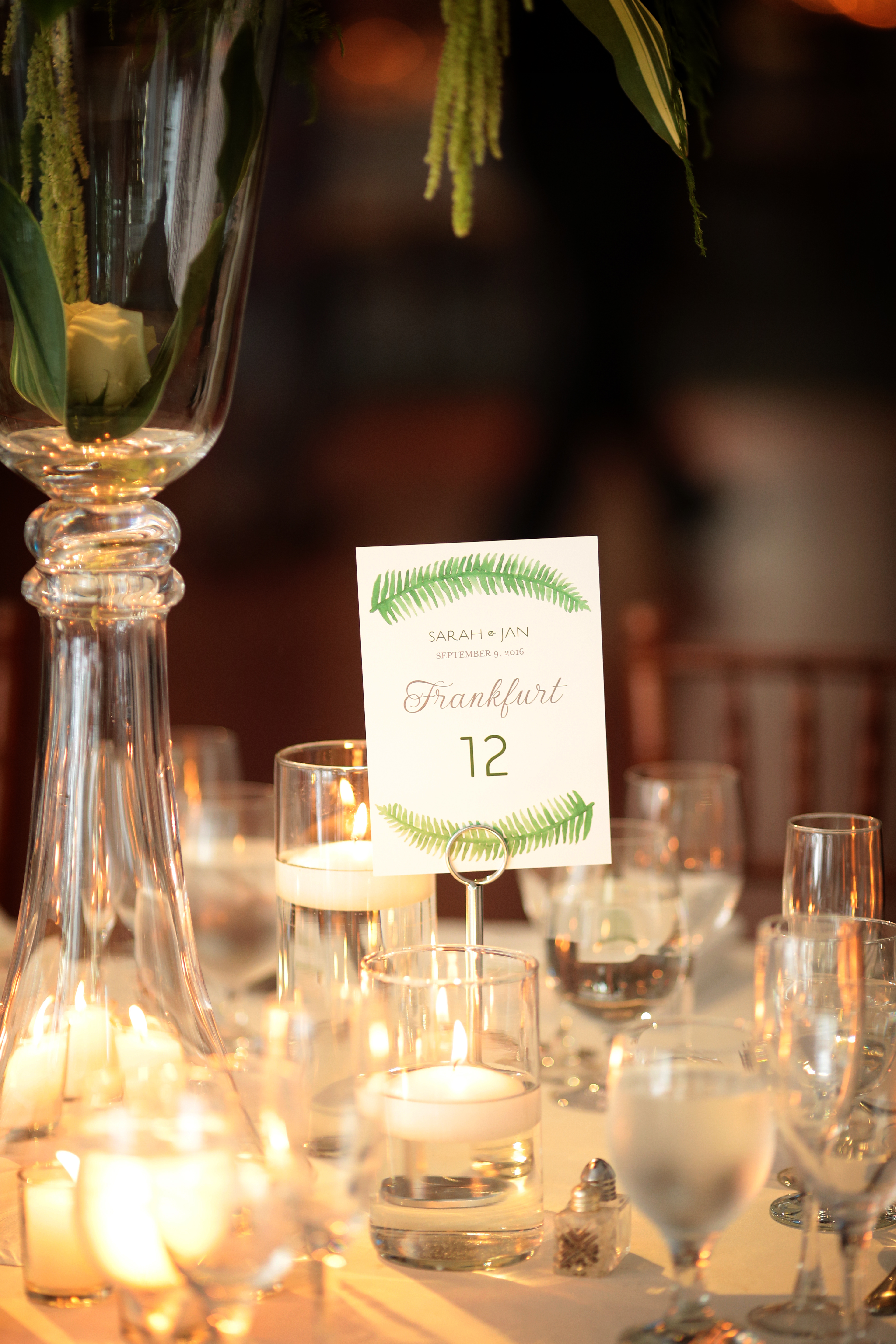 We incorporated greenery into the table names at this New York Botanical Garden Wedding for an added special touch!