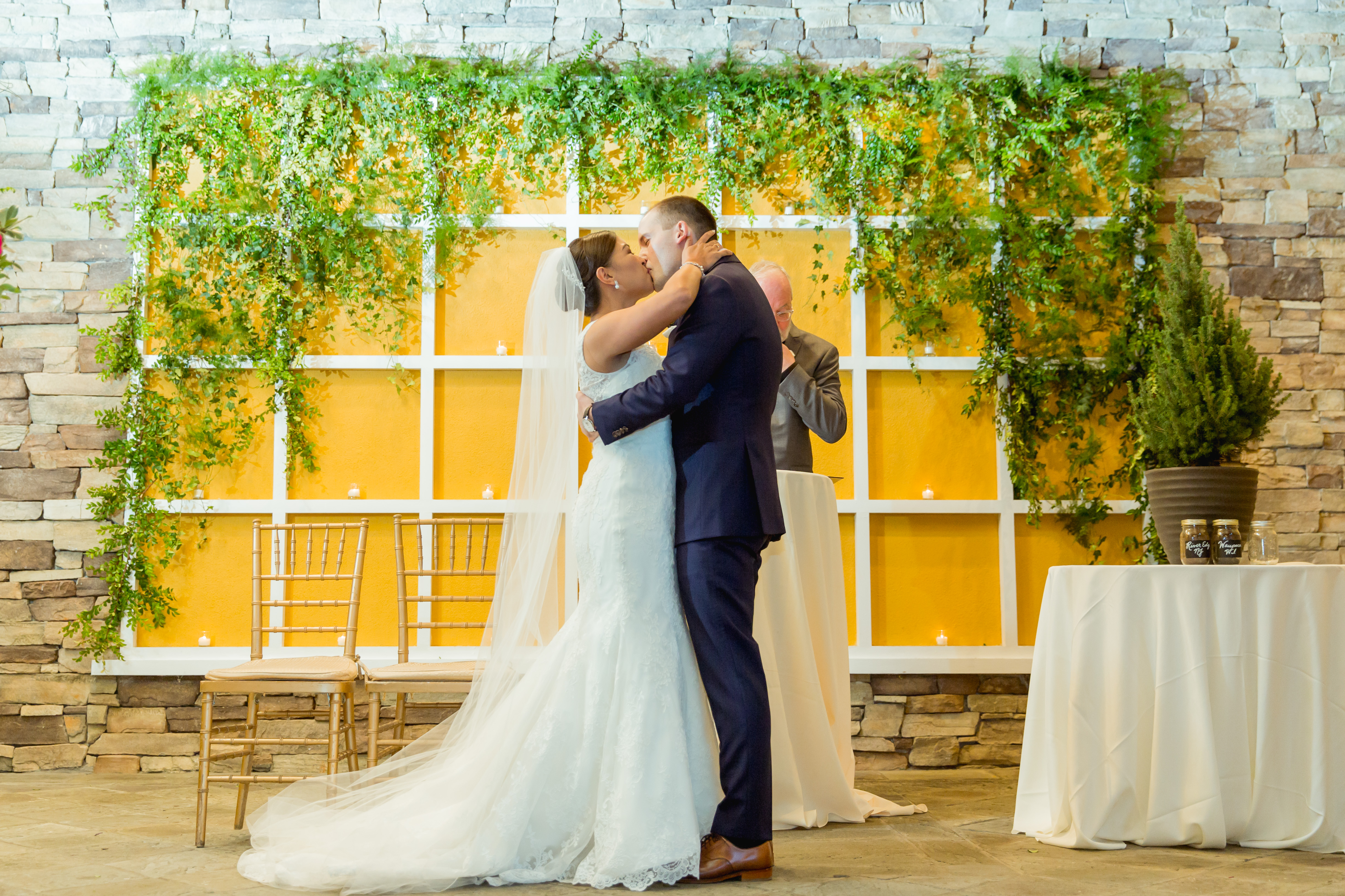 Gorgeous greenery backdrop inspiration for a wedding ceremony!