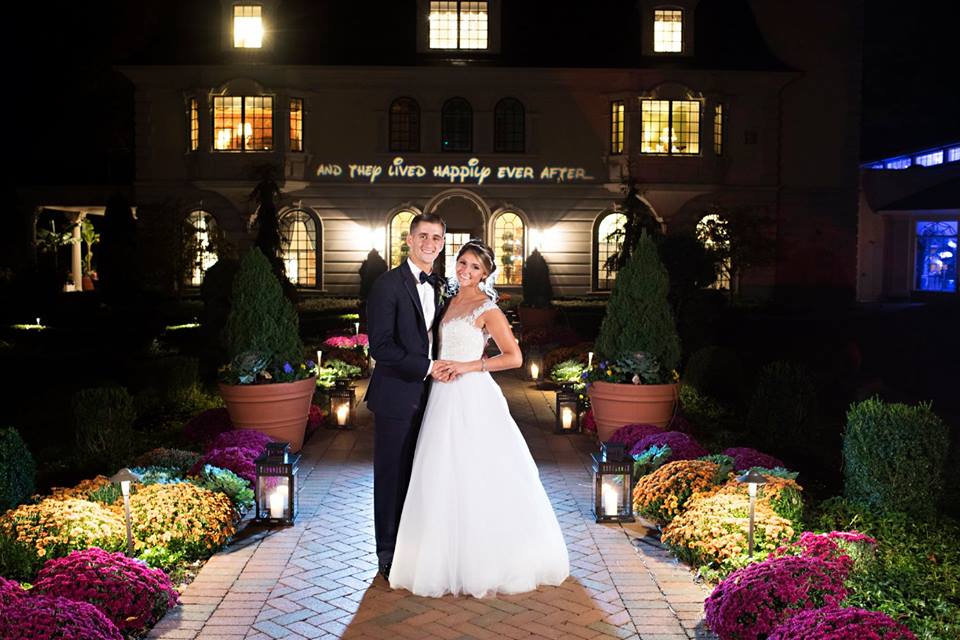 A Disney inspired wedding we designed at The Ashford Estate with our bride in a custom Reem Acra wedding gown and our groom in a classic black tuxedo.