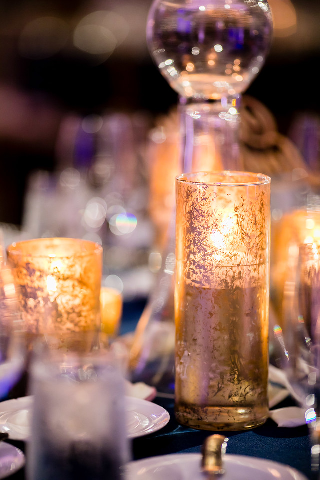 2018 wedding trends include lots of metallics like these gorgeous candle holders from a Fall wedding we designed. Read the blog for more trends and ideas.