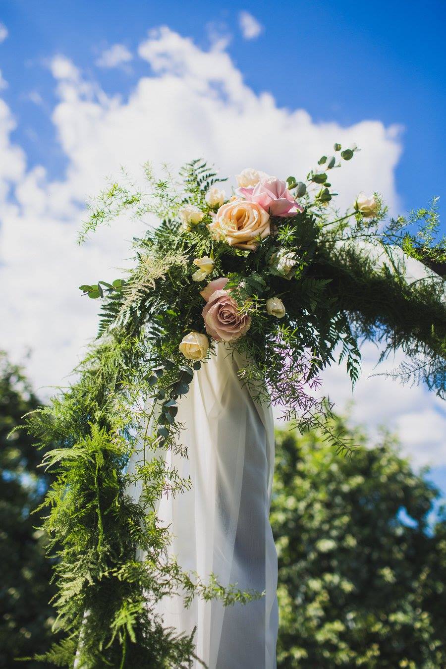 This garden ceremony was super chic with an arbor draped in white, greenery and plenty of pink roses. We have more garden wedding inspiration up on the blog right now!