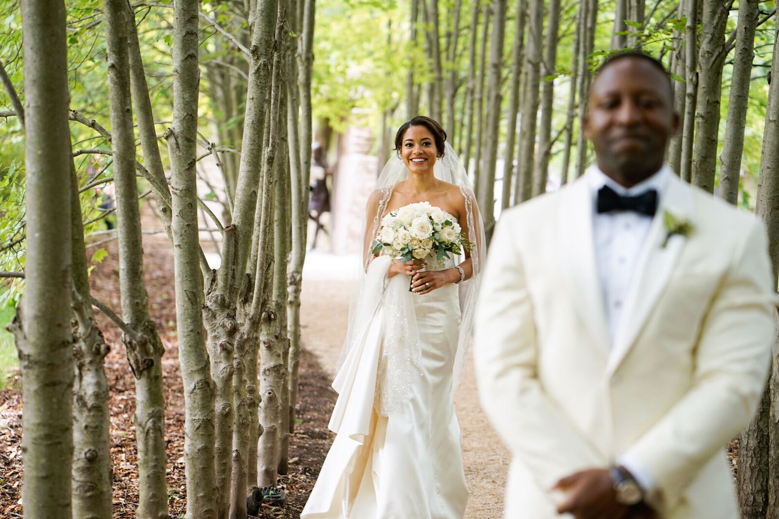 The first look at a wedding has to be perfectly timed and in a great location. Check out this garden wedding we planned and how we kept the public from photobombing this romantic moment!