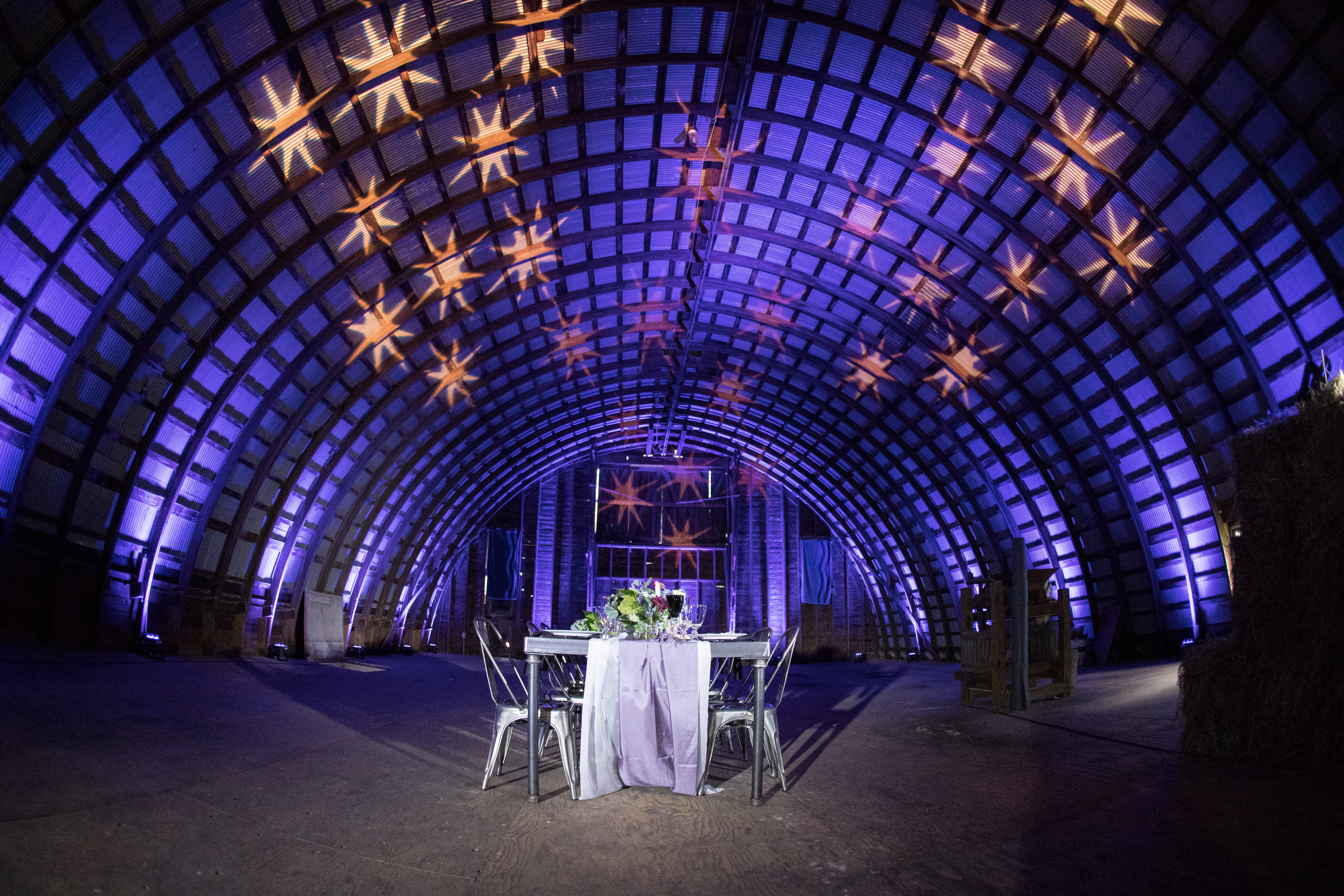 We decked out this barn in stars and plenty of purple for a totally rustic chic wedding.