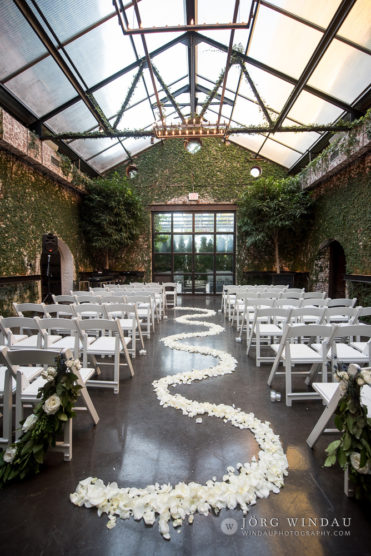 Wedding ceremony with floral aisle