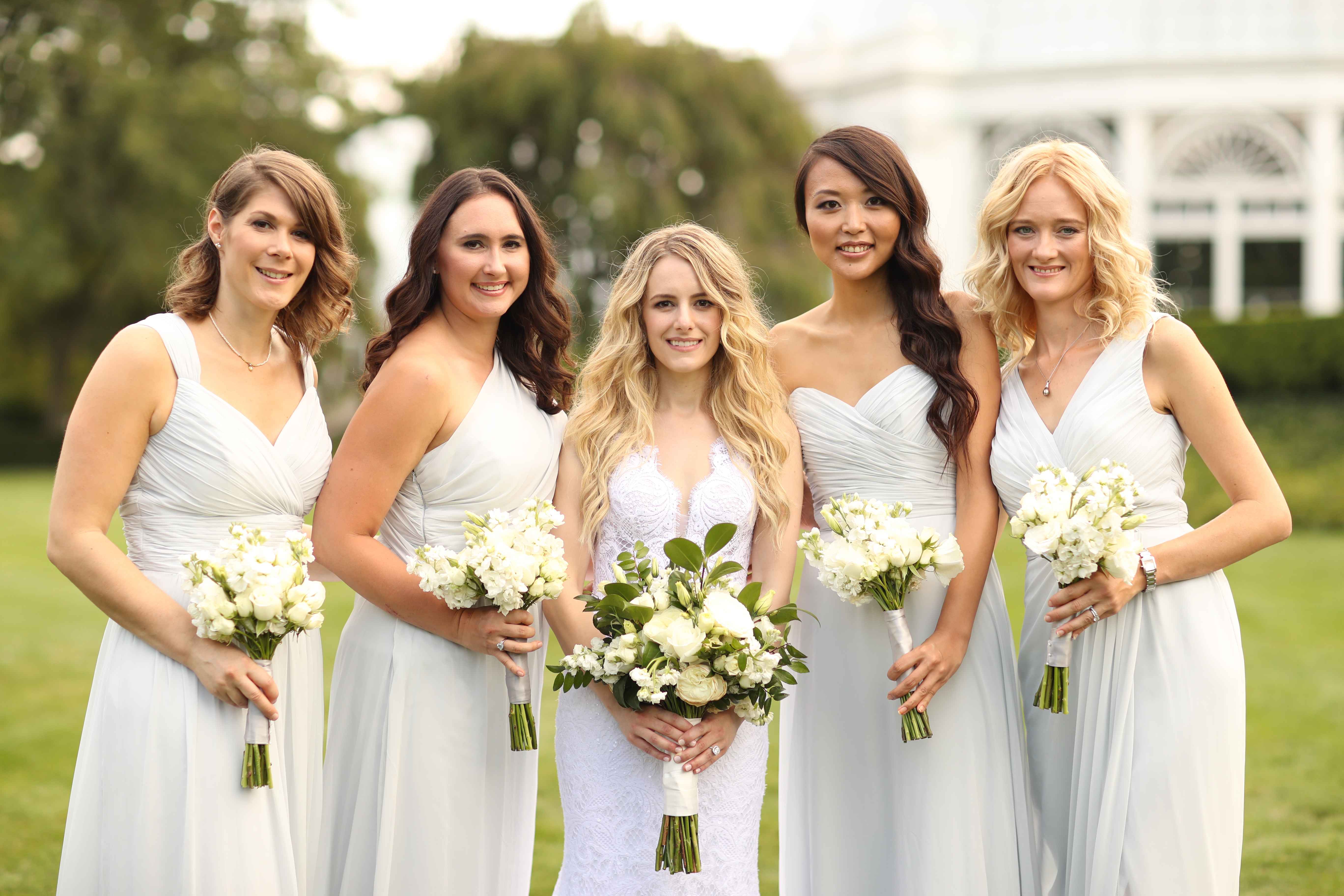 bride and bridesmaids outside
