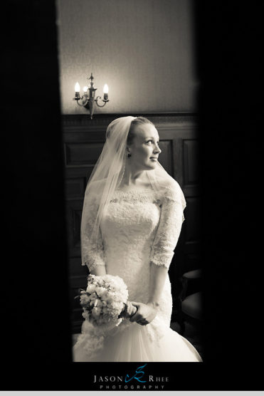 Bride in long sleeve lace gown