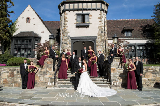 bride, groom and wedding party outside 