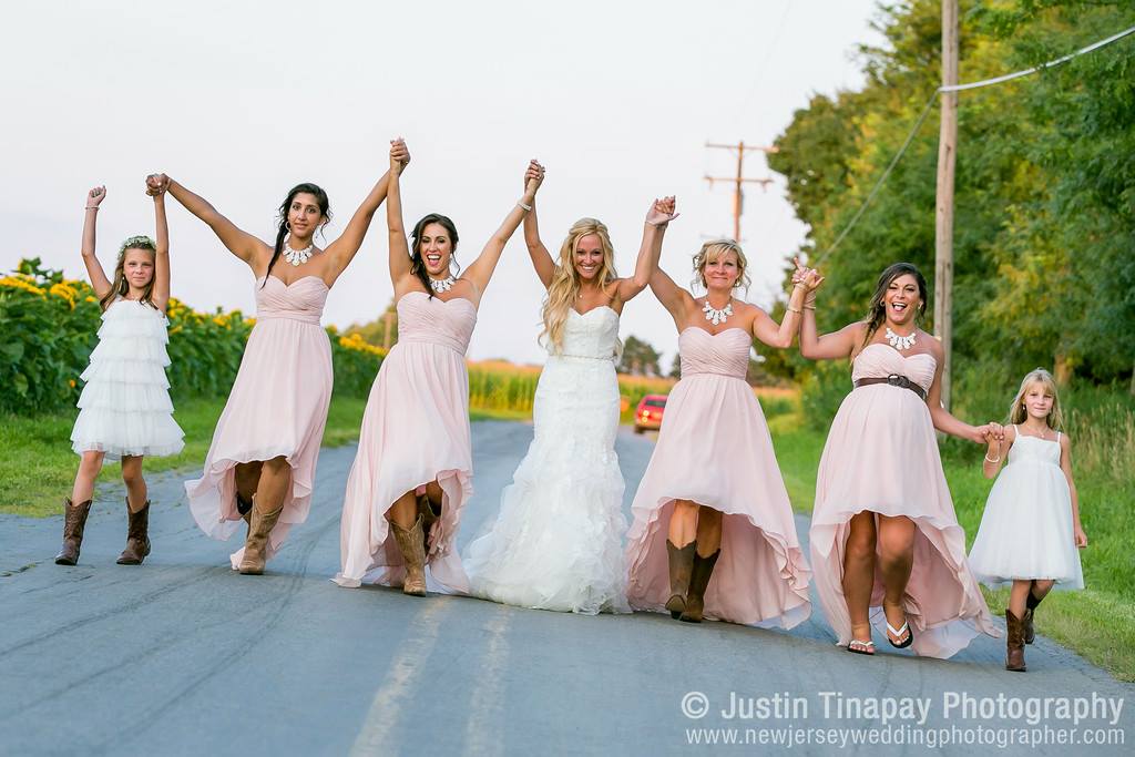 bride and bridesmaids walking down street