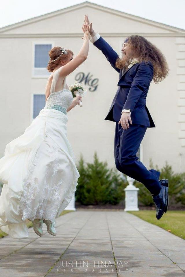 bride and groom high five