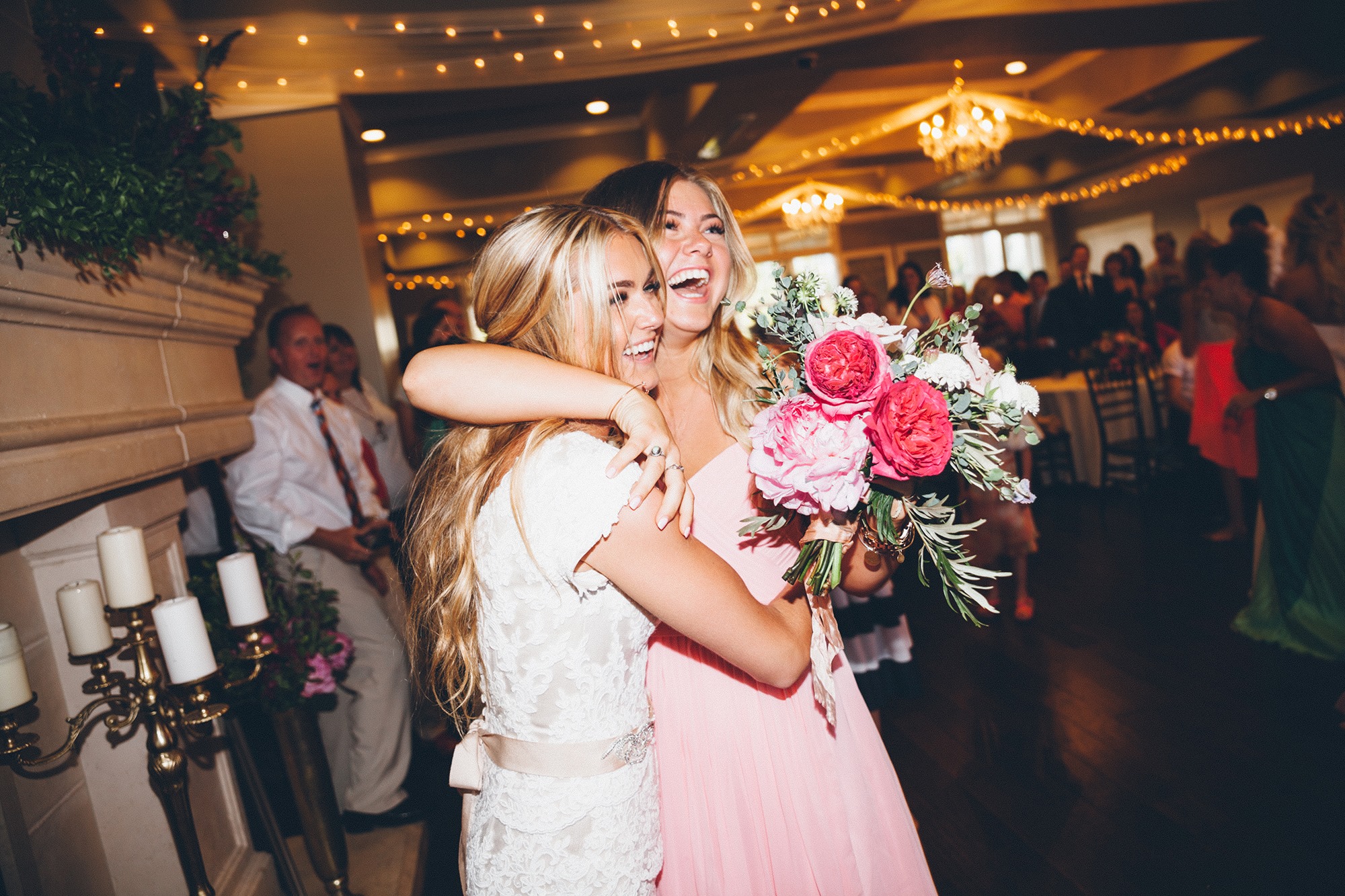 bride and maid of honor with flowers