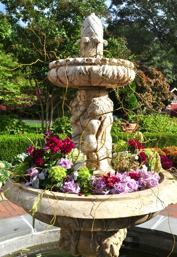 flowers in a fountain at a wedding