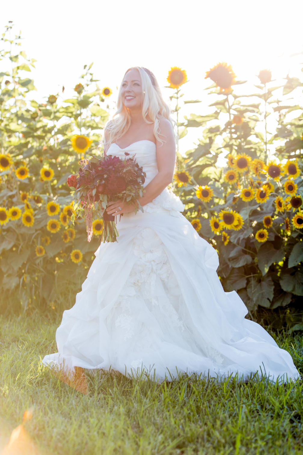 bride with bouquet for outdoor wedding