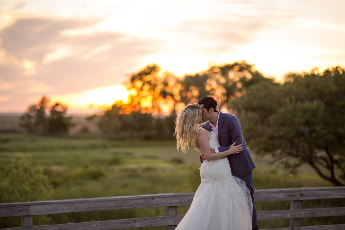 bride and groom sunset