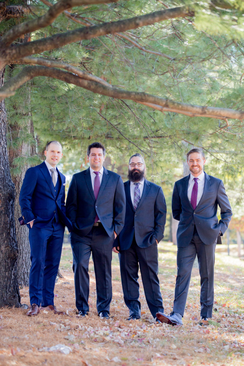 groom and groomsmen in blue suits