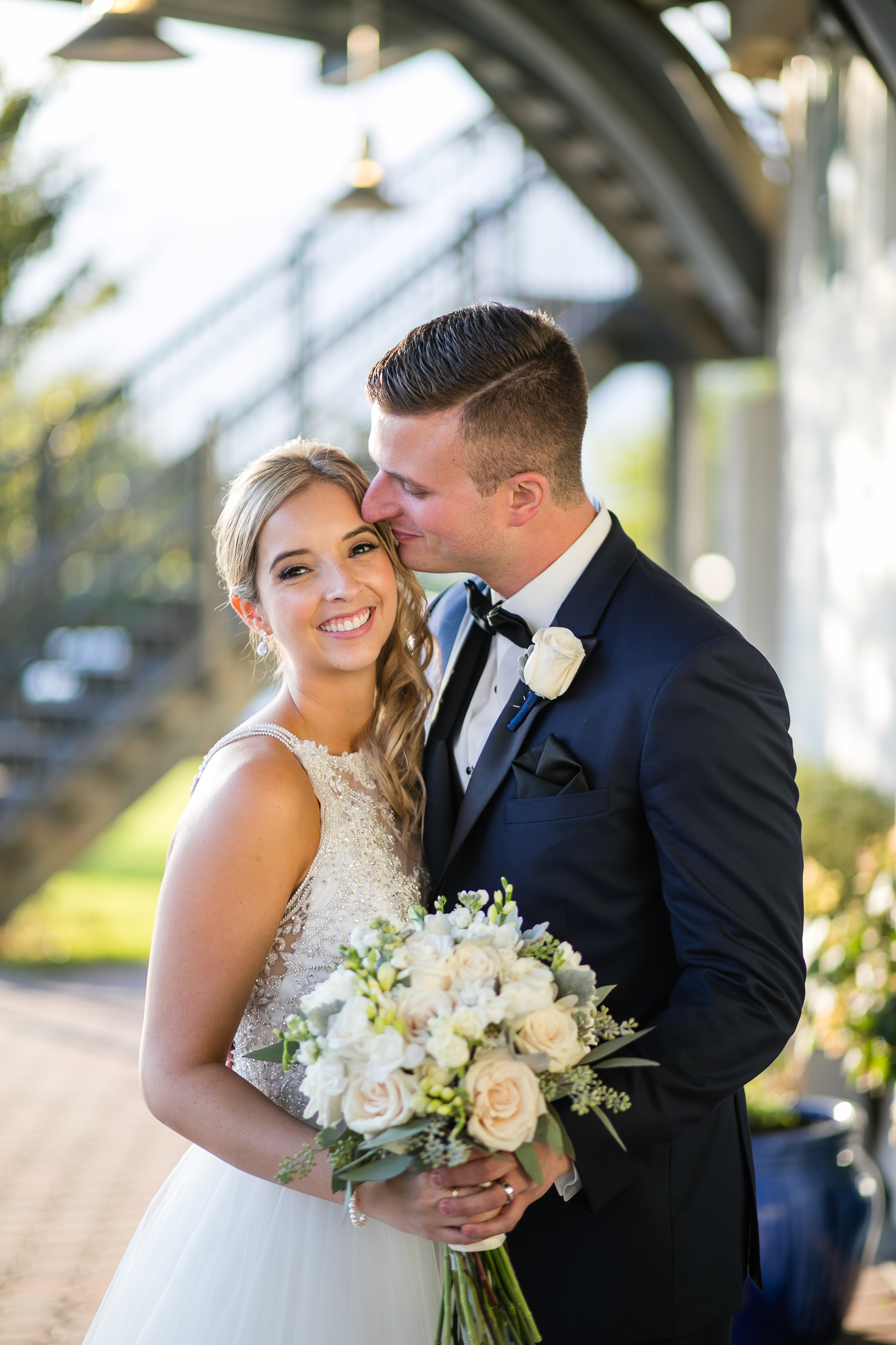 bride and groom kiss