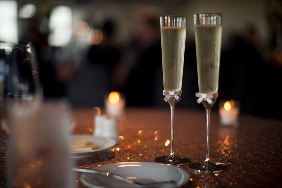 champagne flutes with champagne at wedding