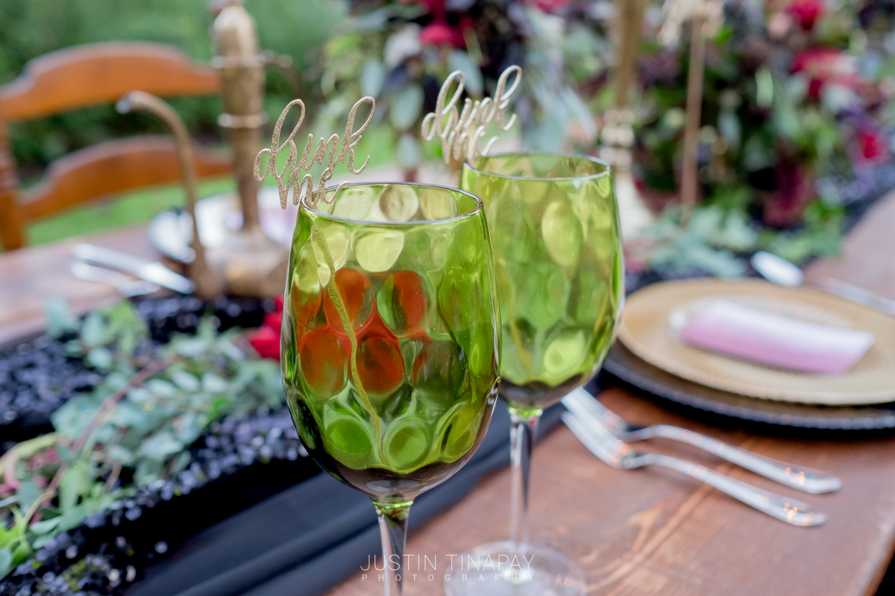 green wine glasses with laser cut drink stirrers
