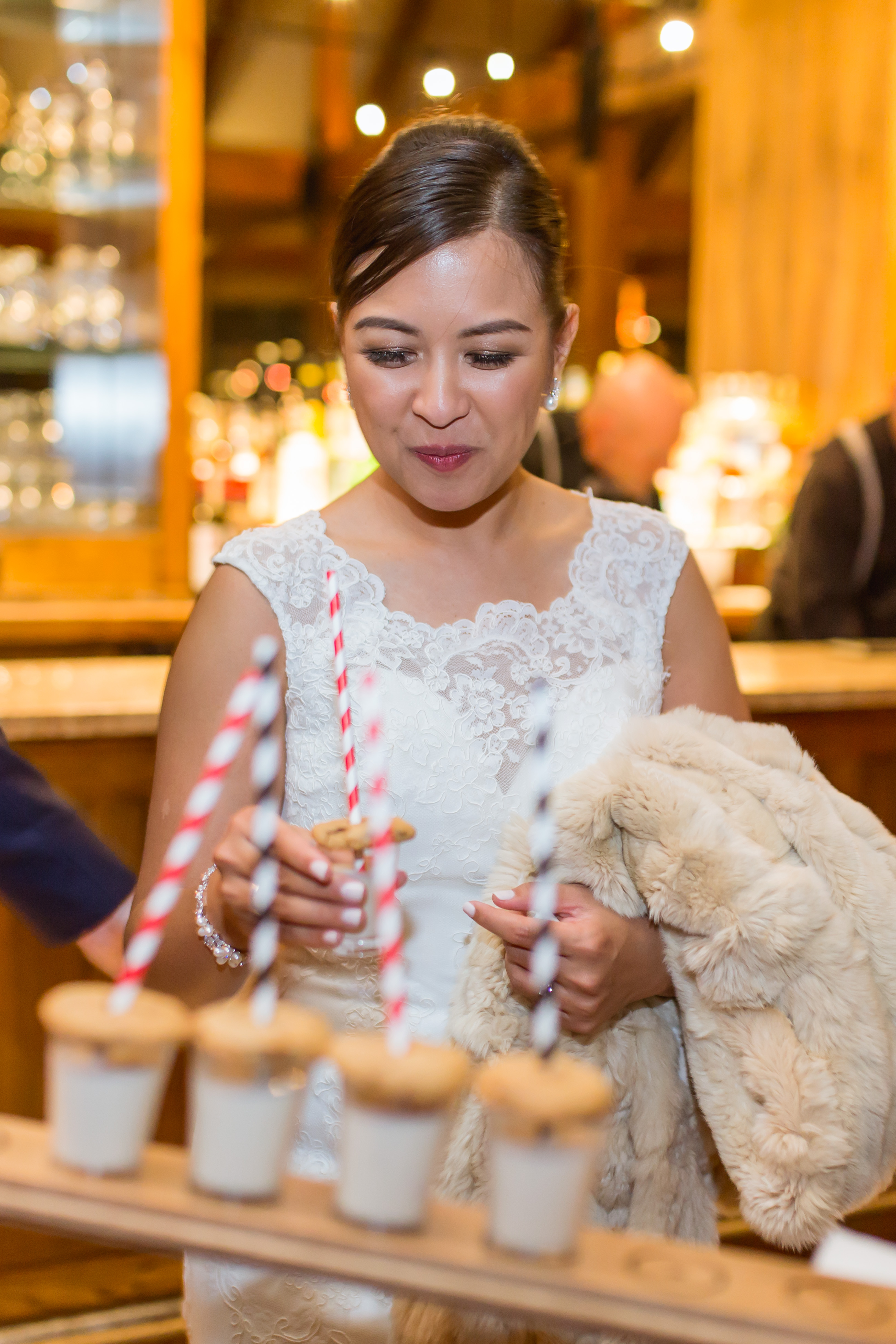 bride with drinks at wedding