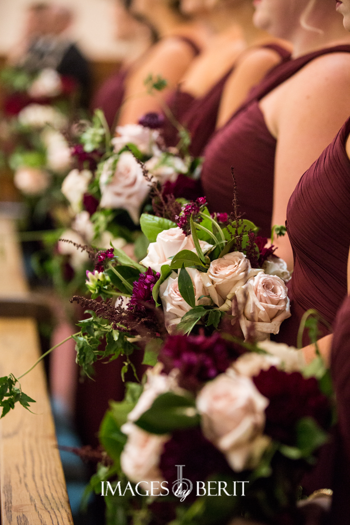 bridesmaid bouquets in blush and wine with greenery