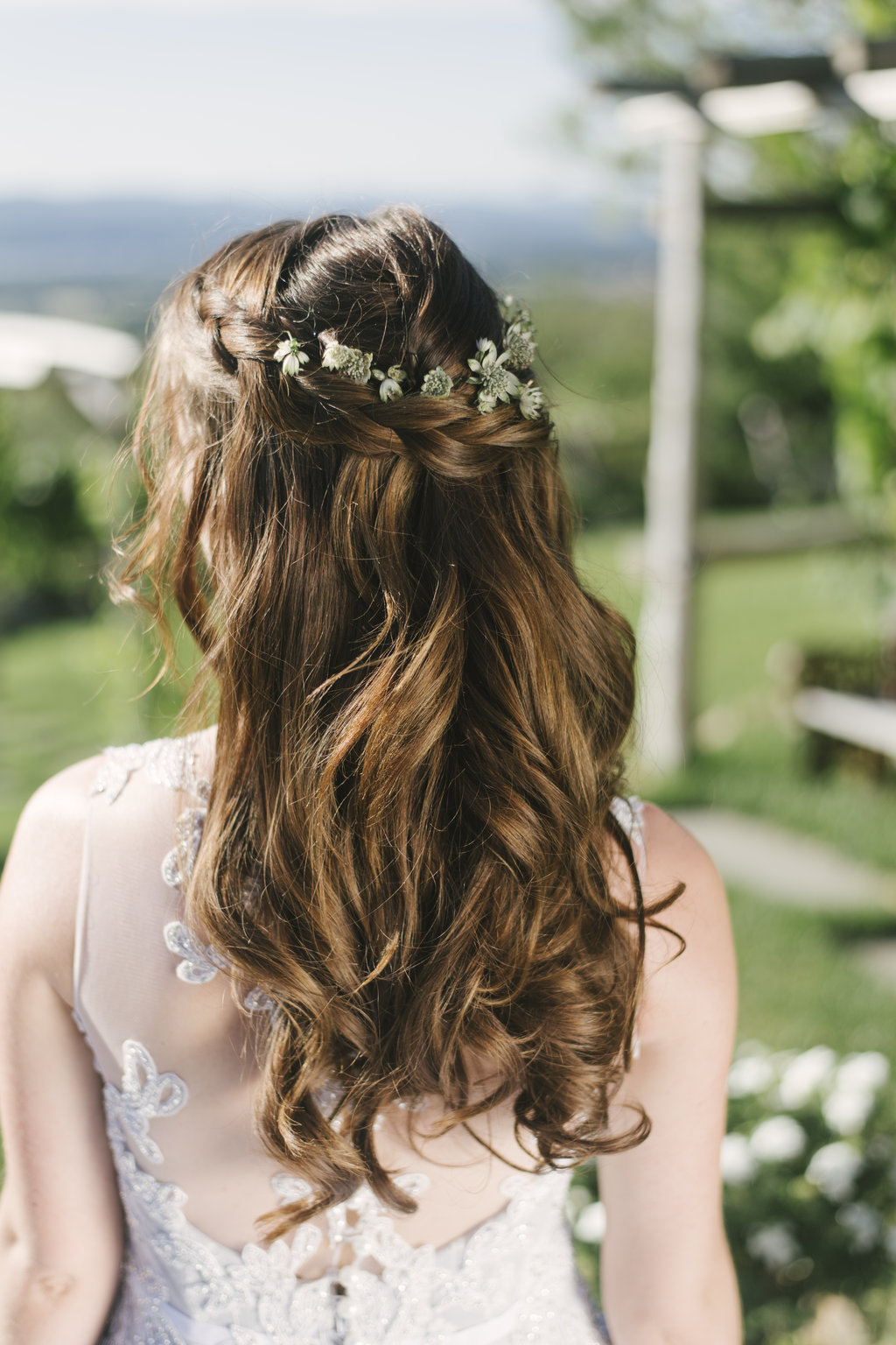 back of bride's hair with floral crown