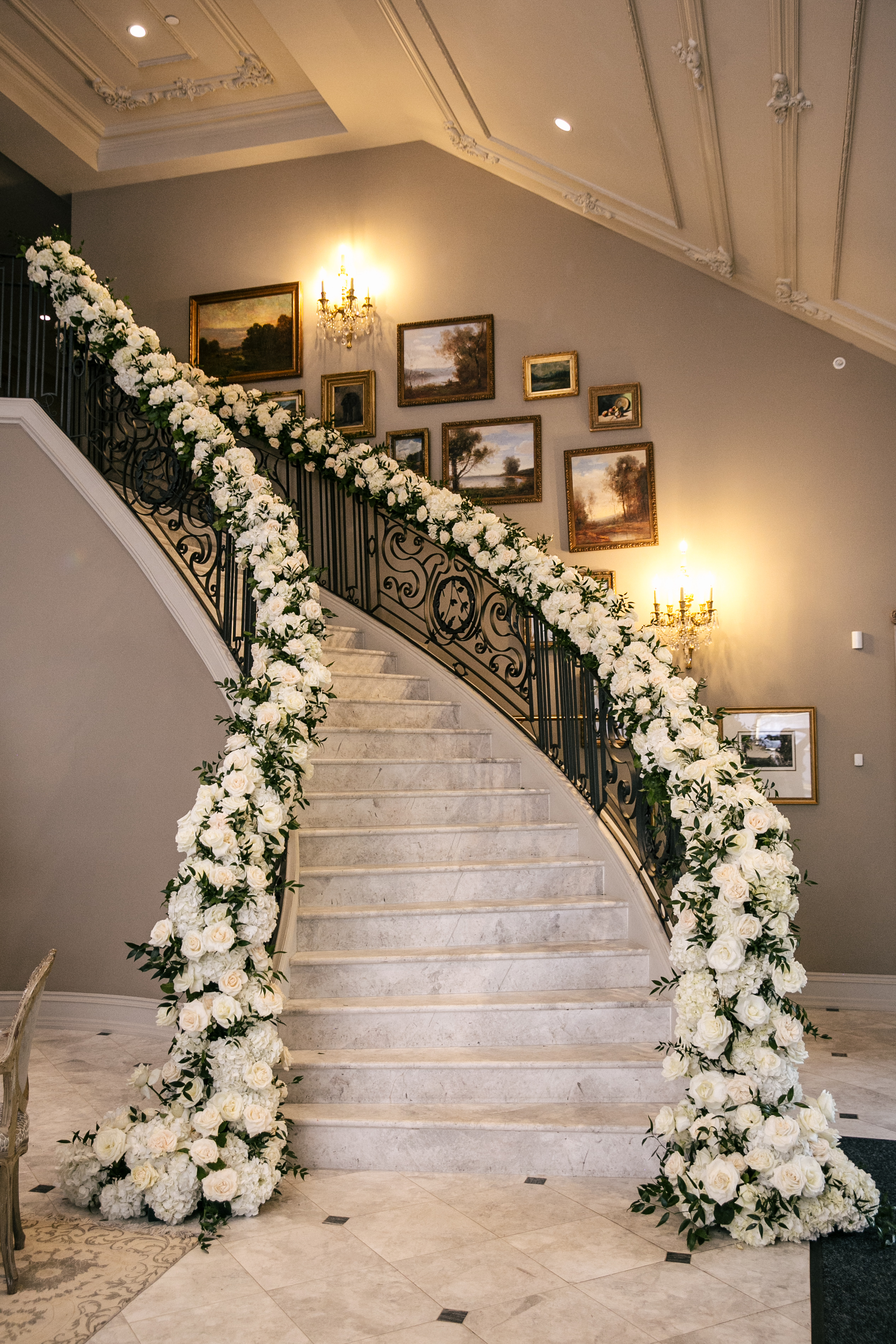 luxury wedding decoration with florals on banisters