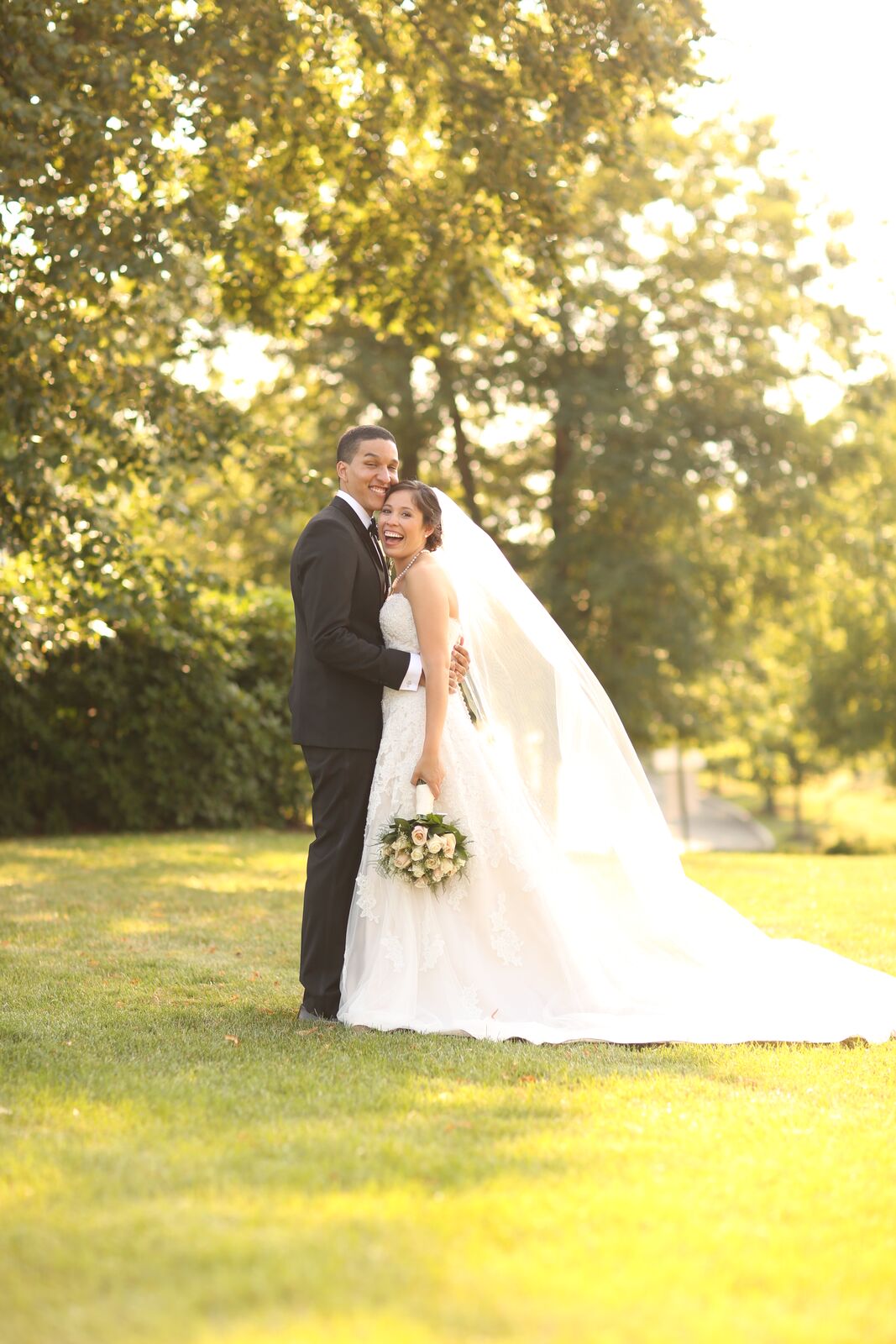 bride and groom outside in sunshine