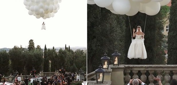 bride arriving to wedding ceremony flying in with white balloons