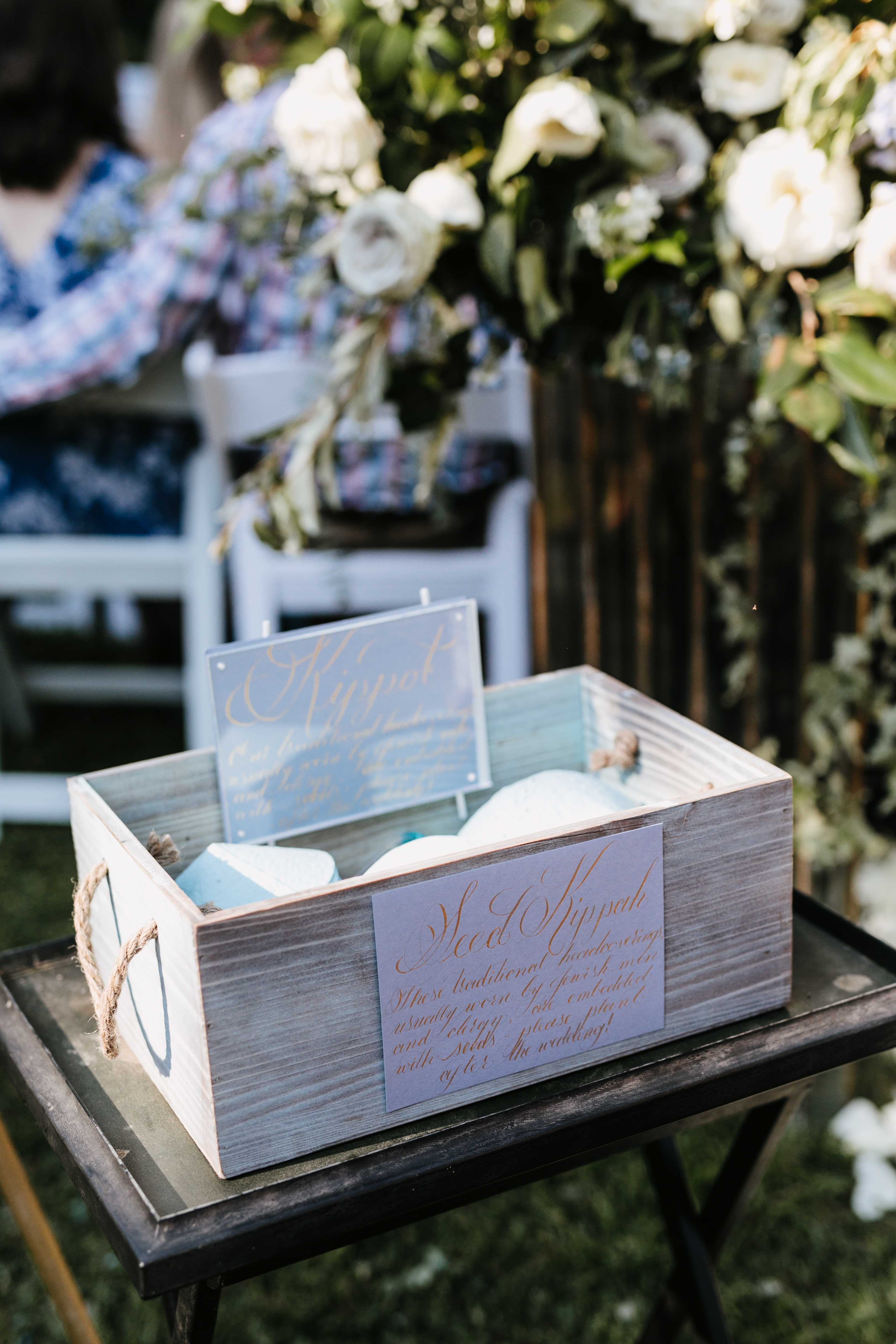 wooden box with ceremony programs