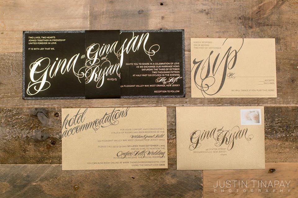 black and gold wedding invitation suite