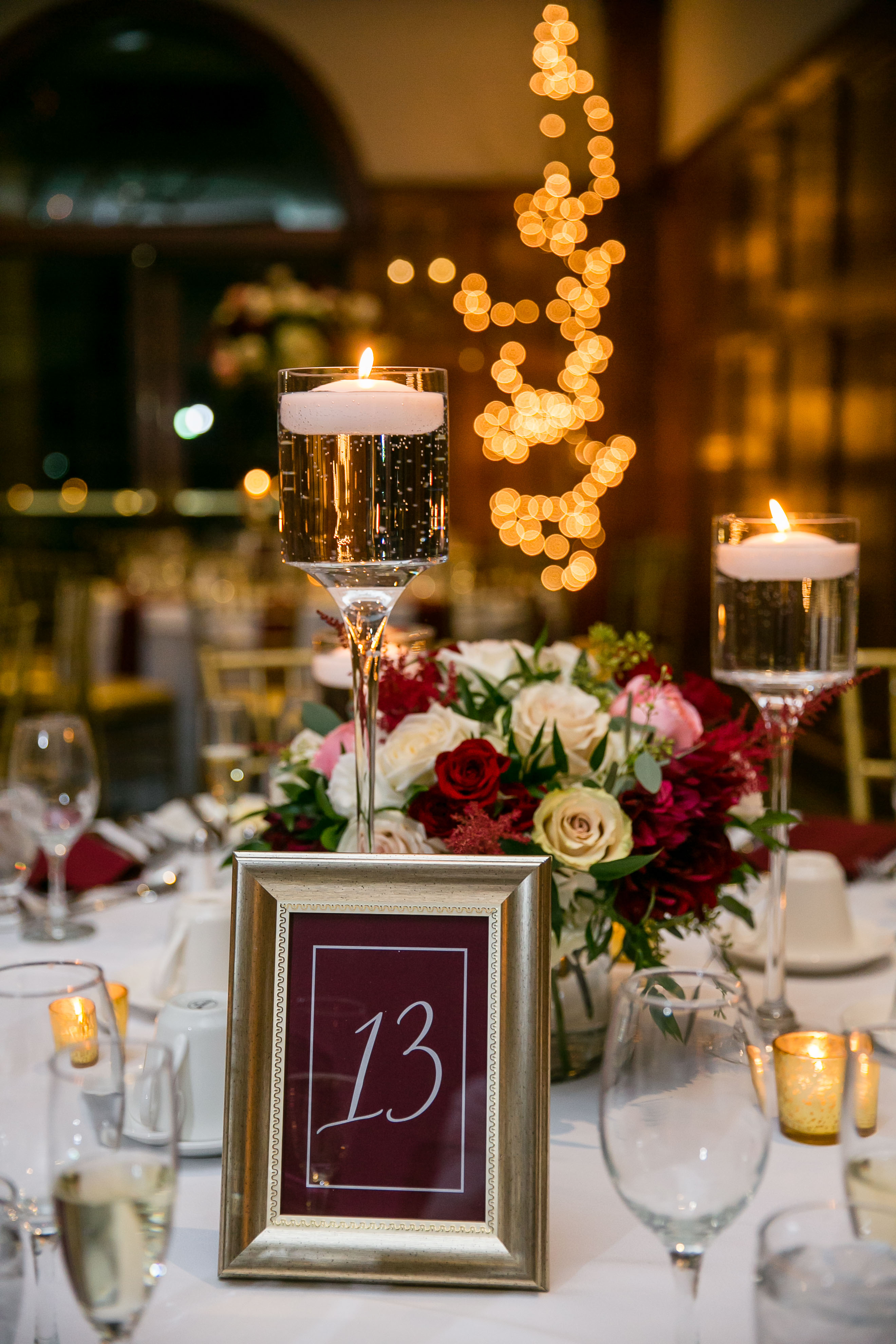 wine marsala reception table with candles