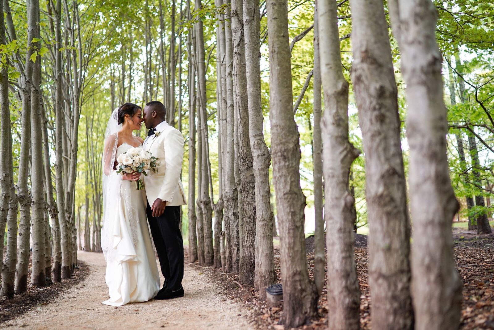 couple kissing during wedding day first look