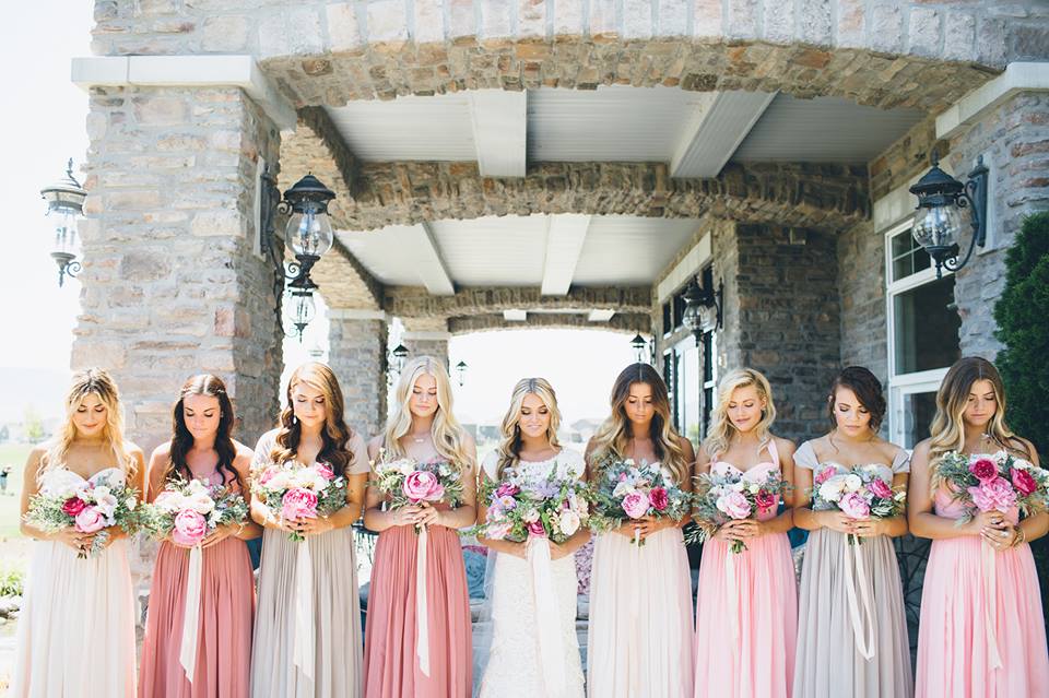 bridesmaids in ombre pink dresses