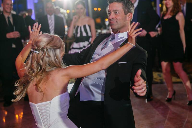 bride and groom having fun dancing