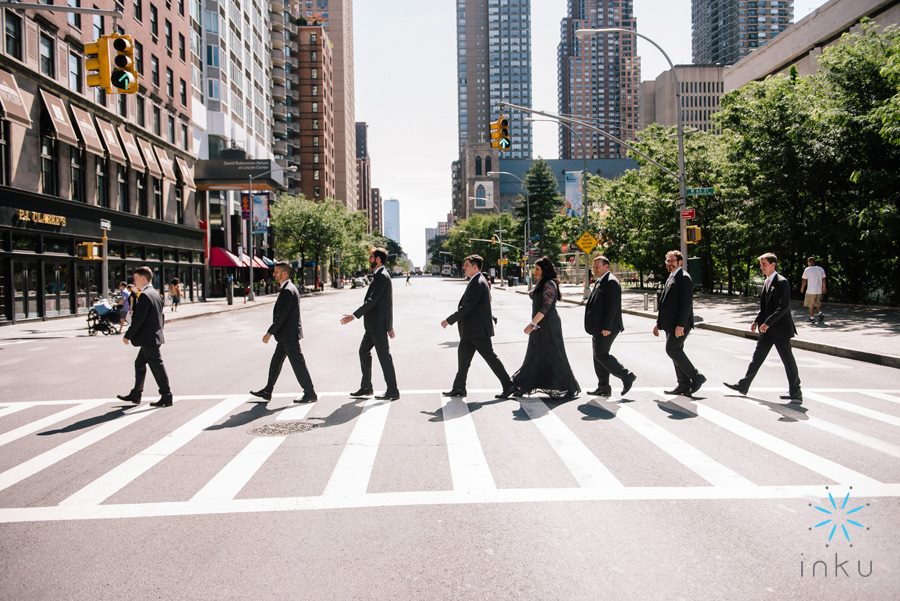 picture of groomsmen walking across the street beatles style