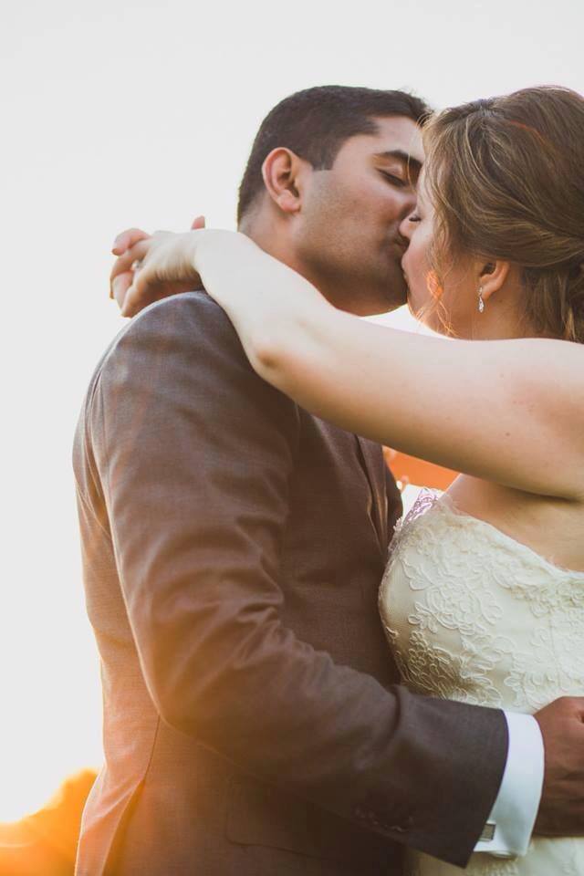 bride and groom kissing