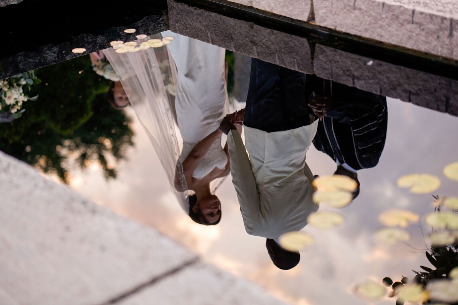 reflection of bride and groom