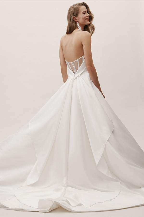 bride with low back wedding gown on