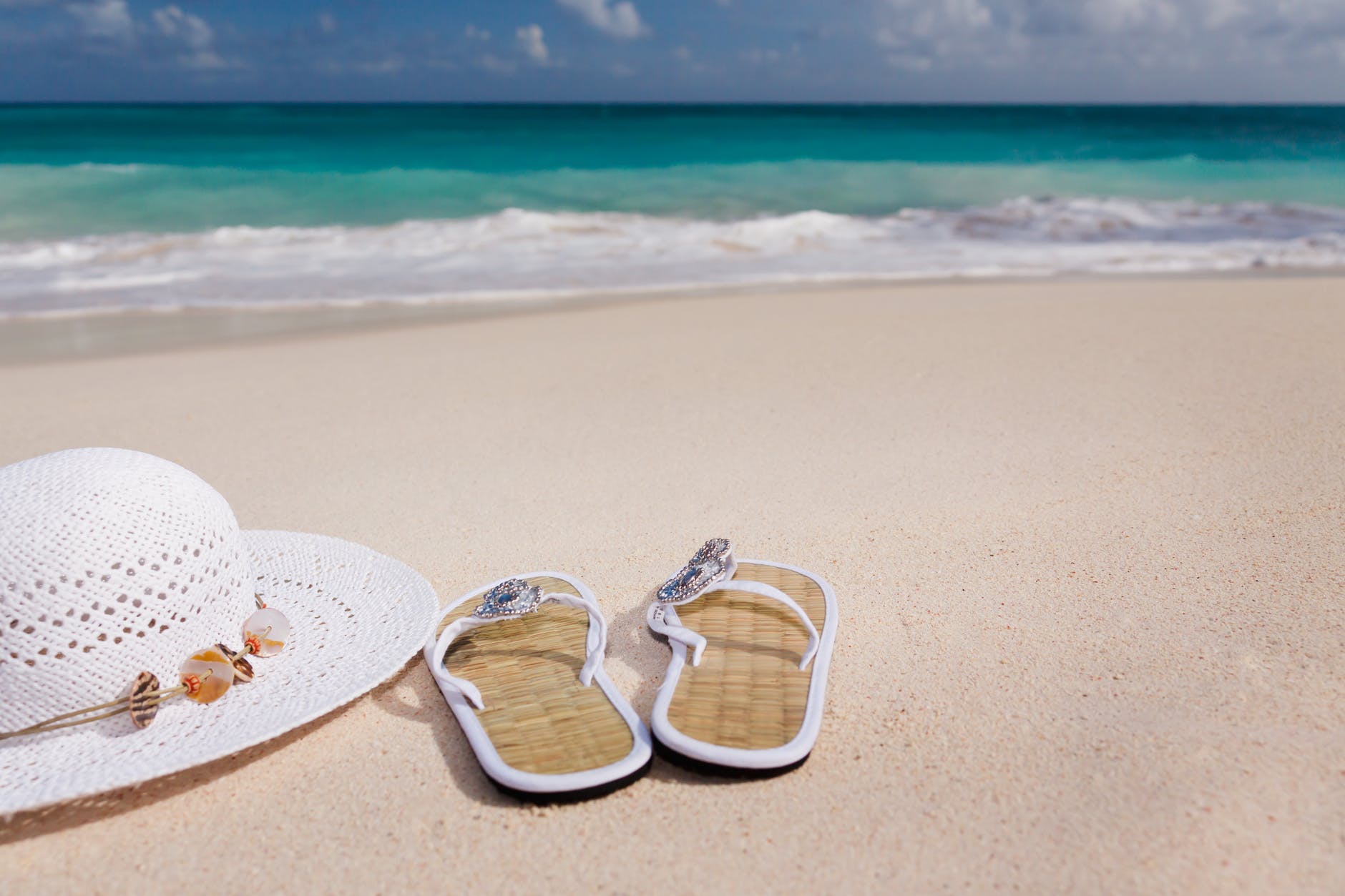 beach sandals and hat