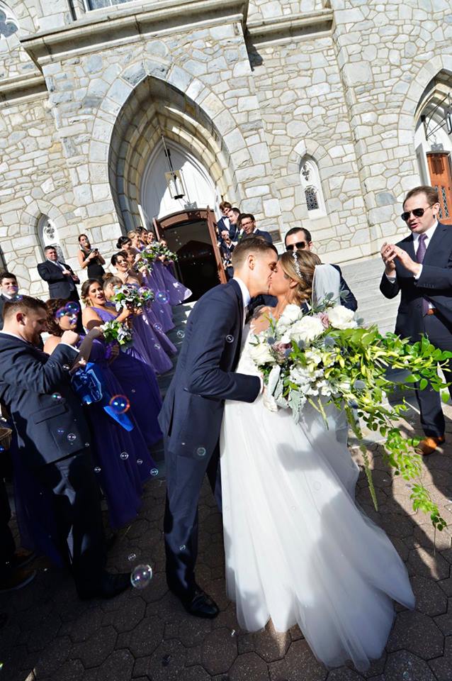 bride and groom outside church