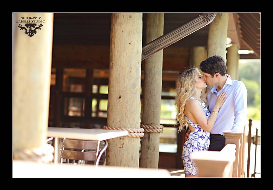 engagement session photo of couple kissing