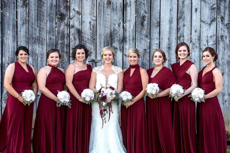 bridesmaids in red gowns