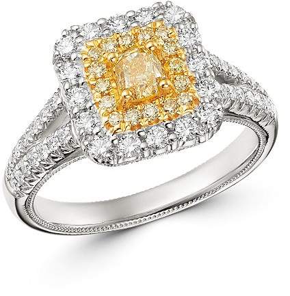 halo engagement ring with yellow center stone