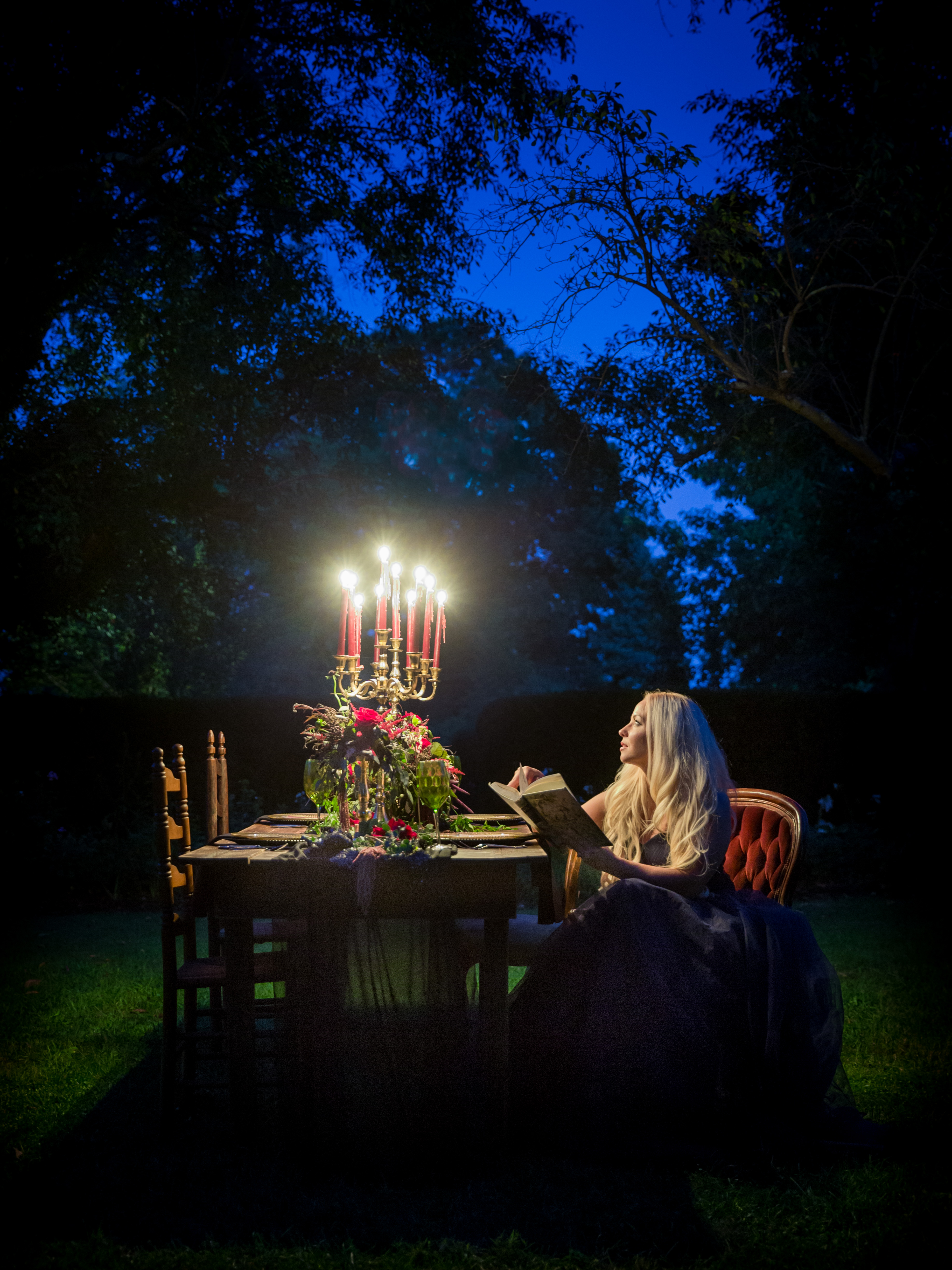 outside picture at night with bride at table