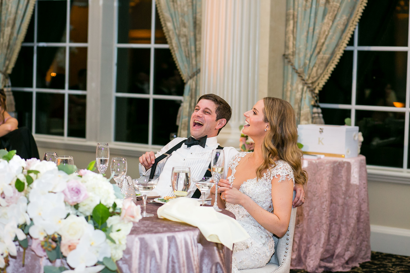 bride and groom laughing