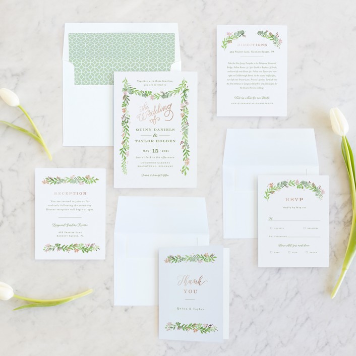 green and white invite suite