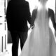 black and white photo of bride and groom post ceremony