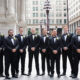 groom and groomsmen in black