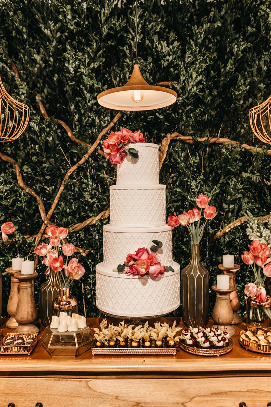 wedding cake and dessert table