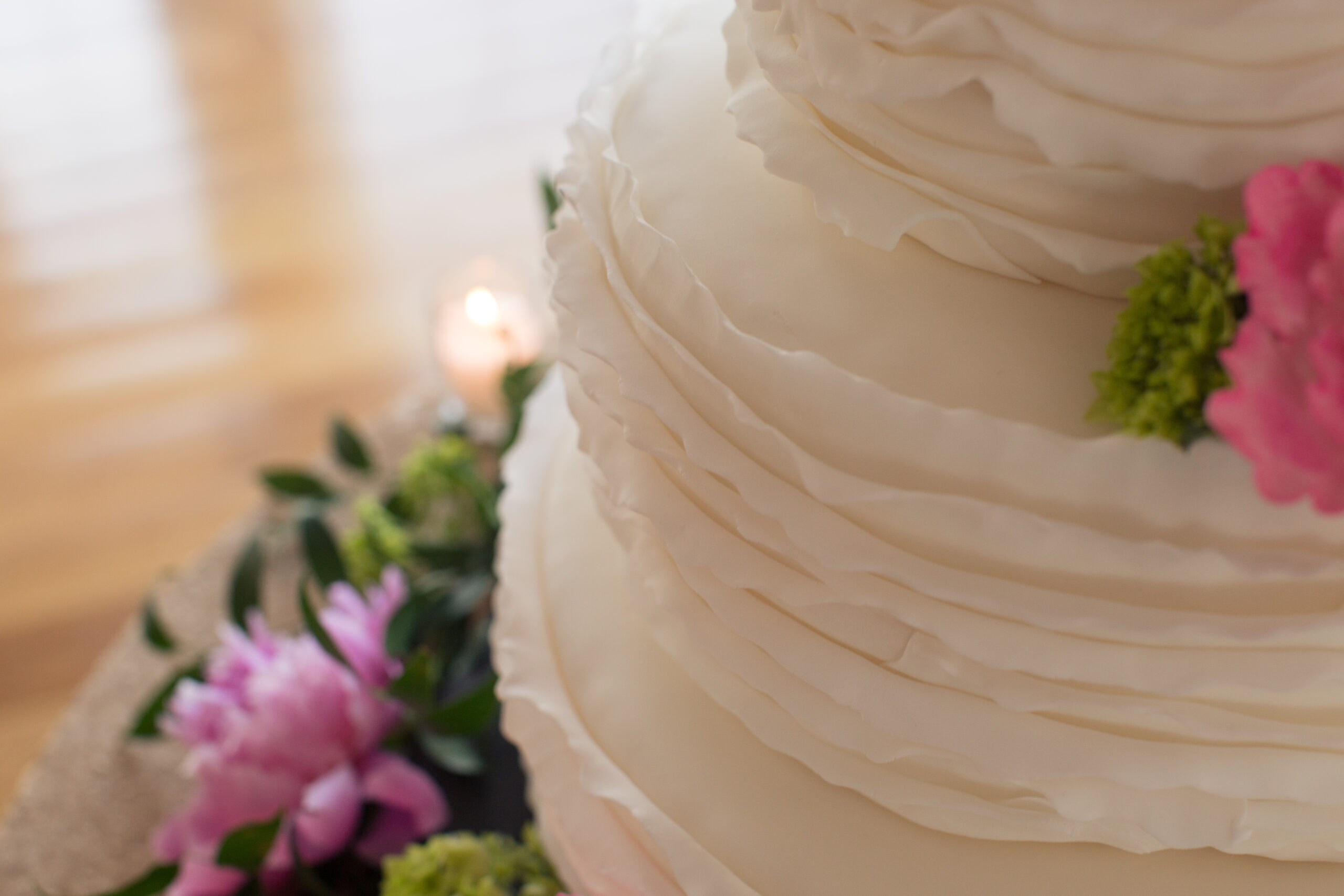 wedding cake with pink flowers